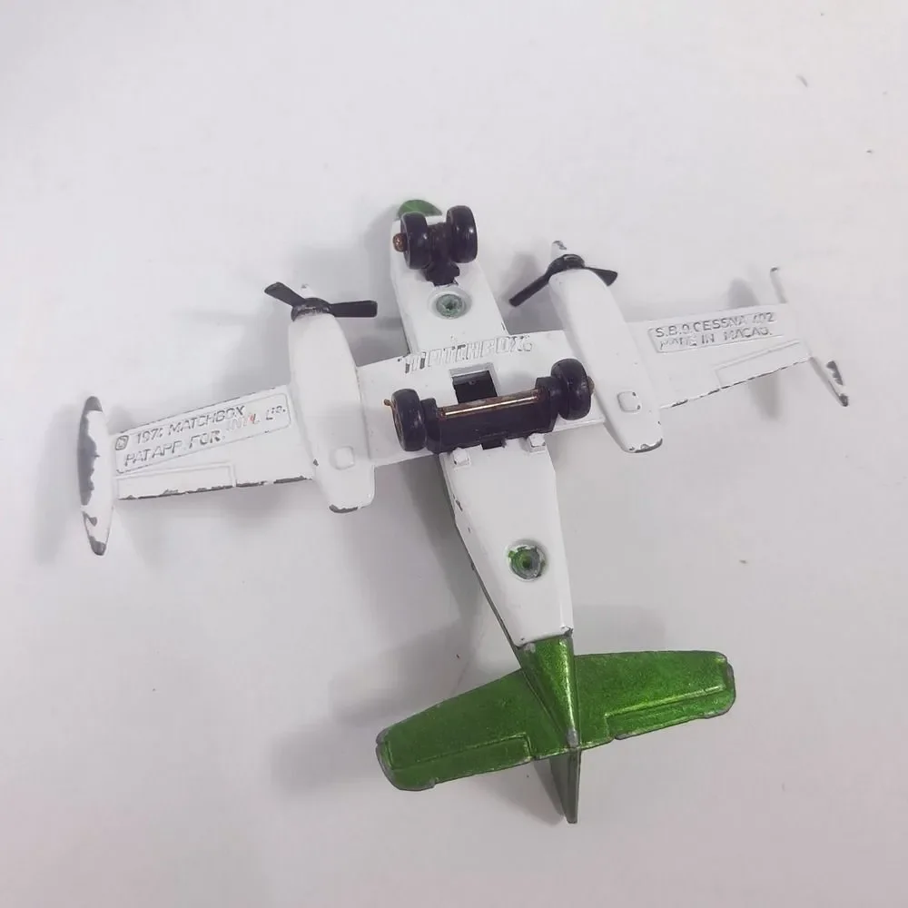 MATCHBOX Sky Busters 1974 SP9 Cessna 402 plane Airplane Macau Diecast green